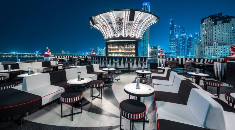 Luxury rooftop restaurant in Dubai decorated for Eid celebrations with skyline views, elegant dining setup, lantern lighting, and festive atmosphere