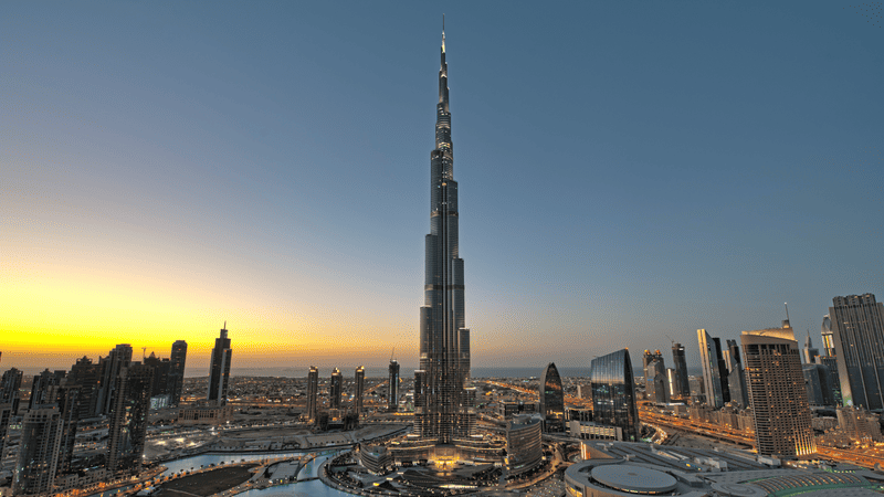 Panoramic view of Dubai’s most Instagrammable landmarks in 2026, including the Burj Khalifa, Museum of the Future, Palm Jumeirah, and Dubai Marina at sunset.