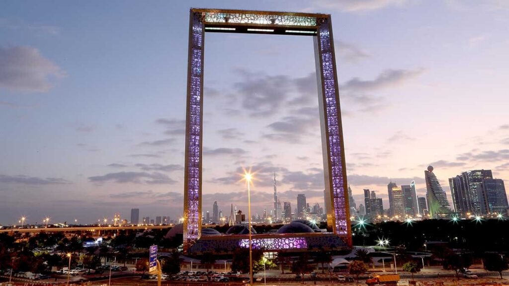 Panoramic view of Dubai’s most Instagrammable landmarks in 2026, including the Burj Khalifa, Museum of the Future, Palm Jumeirah, and Dubai Marina at sunset.