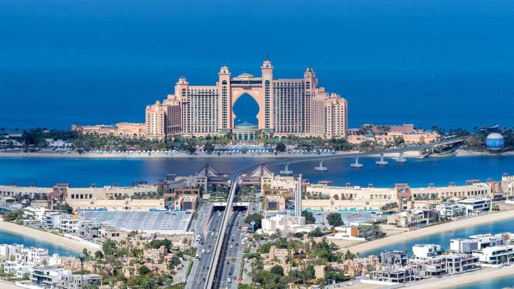 Panoramic view of Dubai’s most Instagrammable landmarks in 2026, including the Burj Khalifa, Museum of the Future, Palm Jumeirah, and Dubai Marina at sunset.