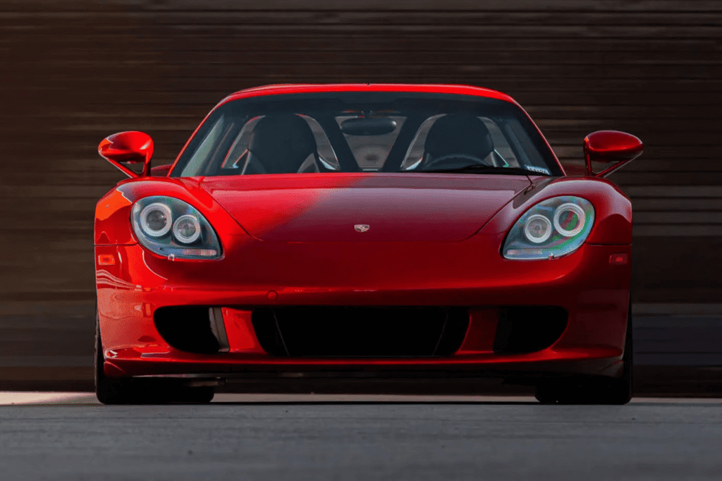 Rare Porsche Carrera GT finished in Ferrari Rosso Fuoco red at auction