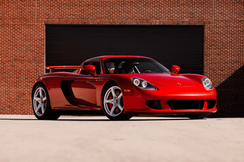 Rare Porsche Carrera GT finished in Ferrari Rosso Fuoco red at auction