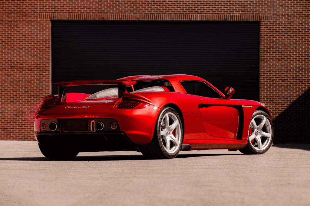 Rare Porsche Carrera GT finished in Ferrari Rosso Fuoco red at auction